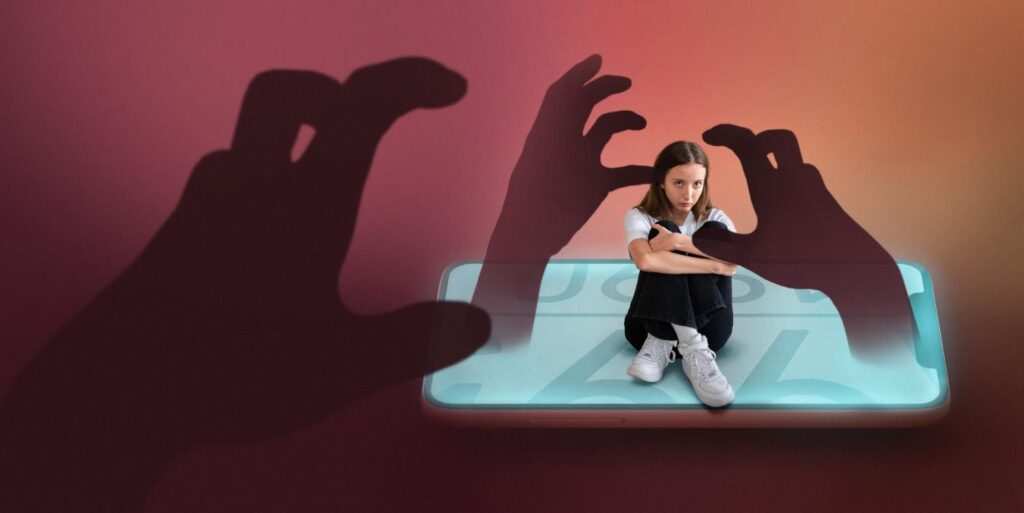 Teenager sitting on a smartphone feeling stressed with dark shadows around, representing digital burnout and online pressure.